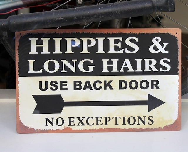 Typical sign you'd see in a shop in Woodstock. Image via Gronvik.