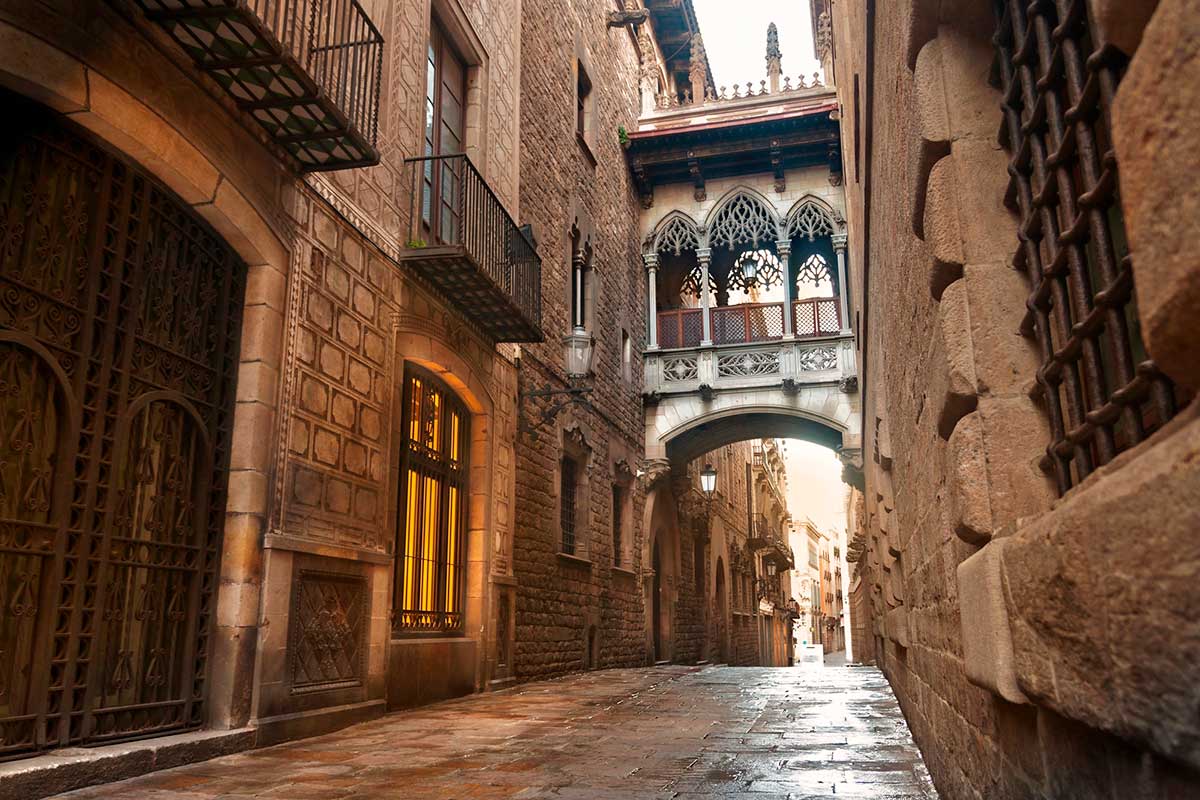 Carrer del Bisbe, a picturesque street in Barcelona Gothic Quarter.
