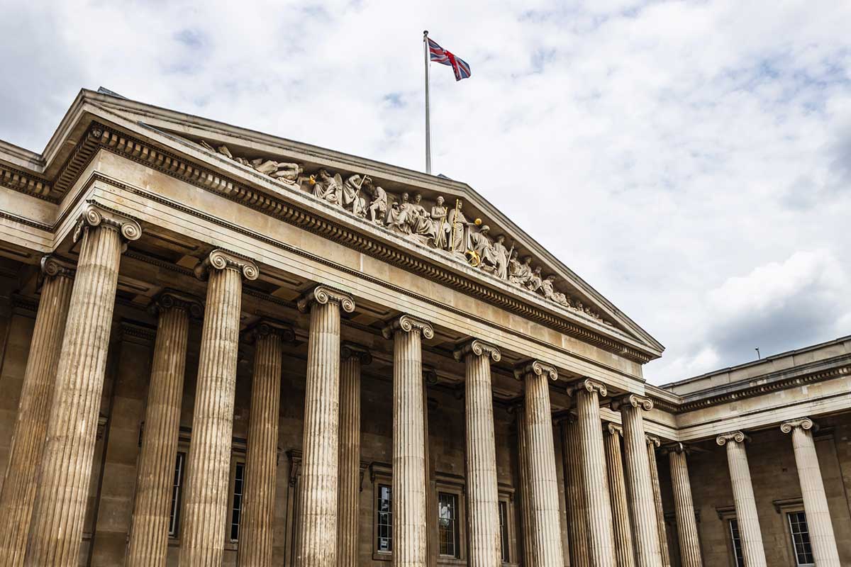 The grandeur of the British Museum neoclassical facade, featuring majestic columns and timeless architectural elegance.
