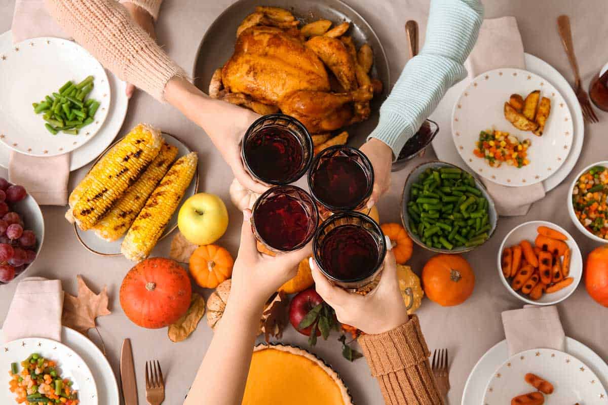 Women enjoying a traditional Thanksgiving meal.