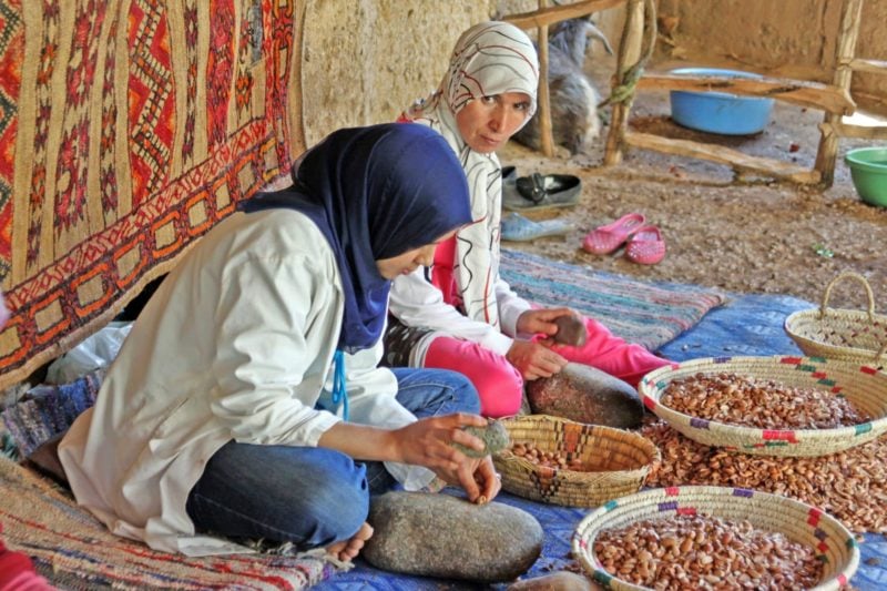 morocco travel women making argan oil