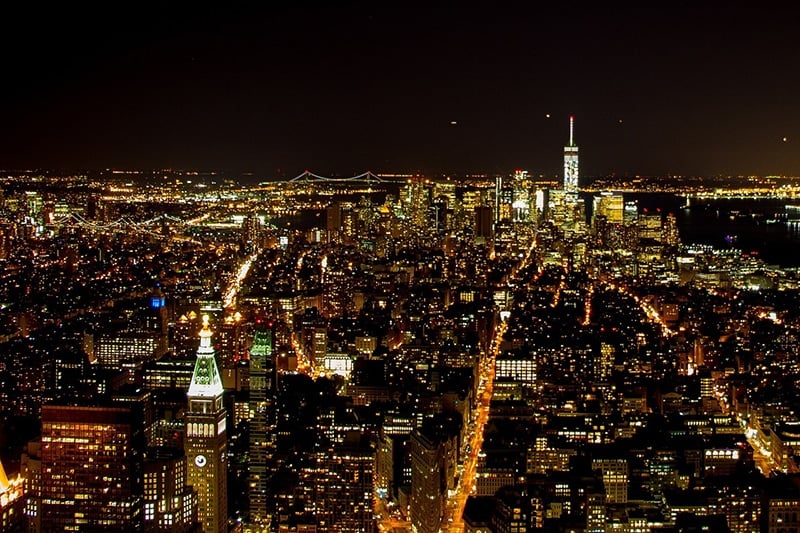 See the New York skyline at night from the Empire State Building