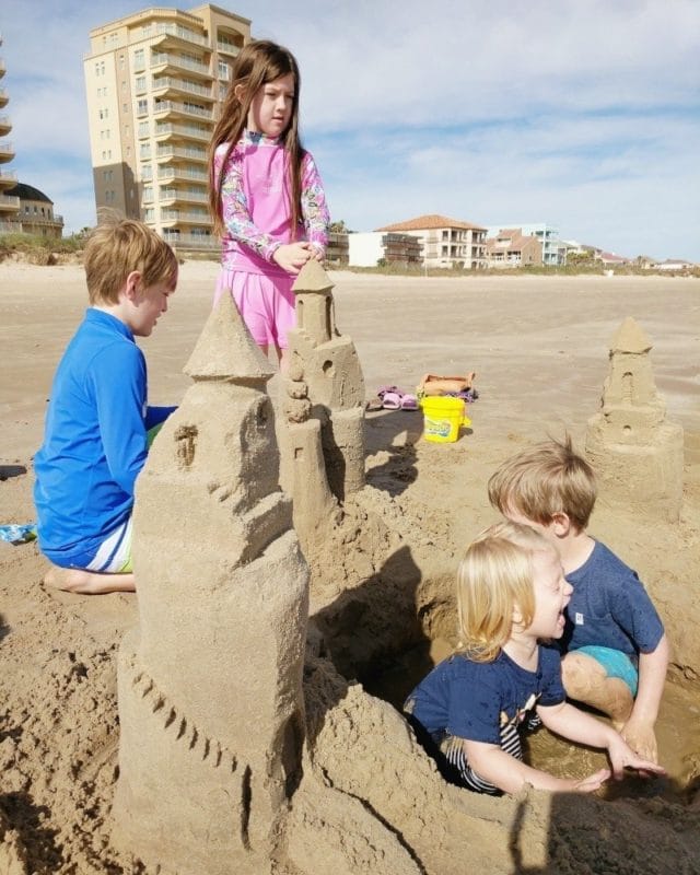 Traveling full time with family means many adventures -- like sandcastle-making lessons!