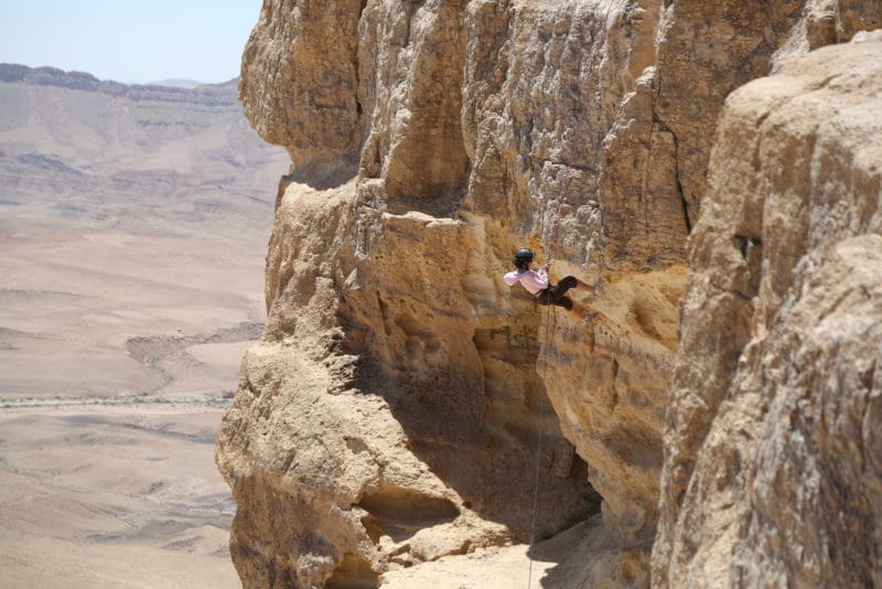rapelling Ramon Crater while travelling in israel