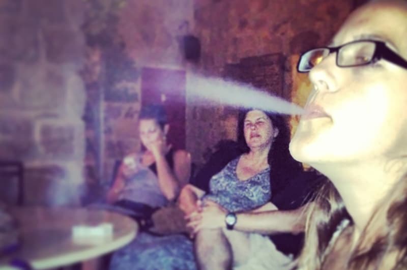 Smoking shisha during a trip to Jordan 