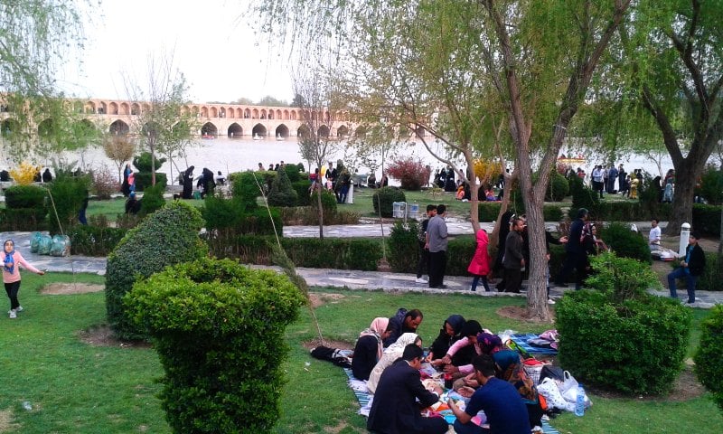 Iranians having picnic in a public park in Isfahan during solo female travel in Iran