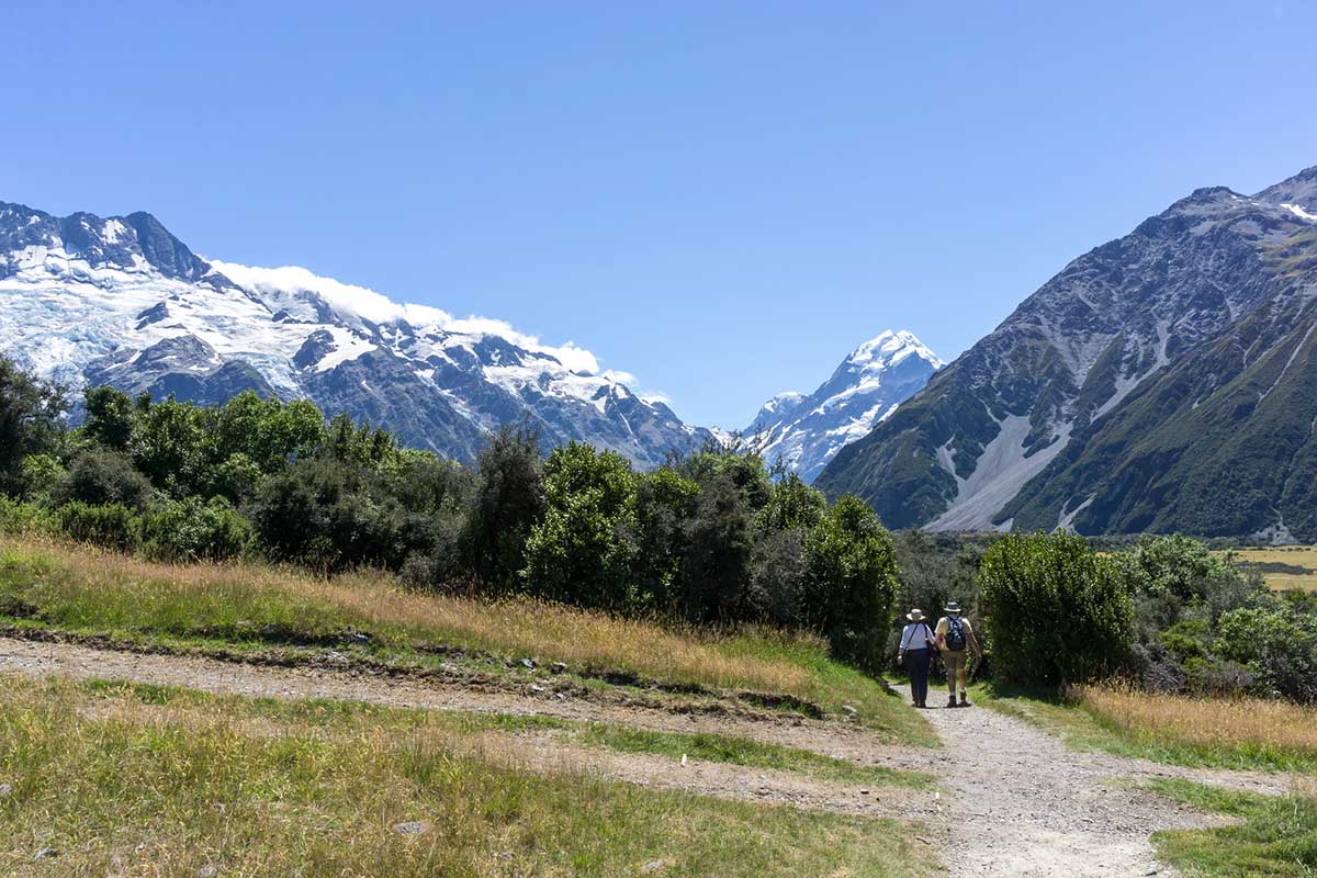 Couples in Kea Point Track, New Zealand.