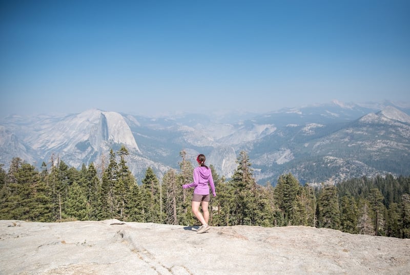 Gazing out toward Yosemite's iconic Half Dome from the top of Sentinel Dome