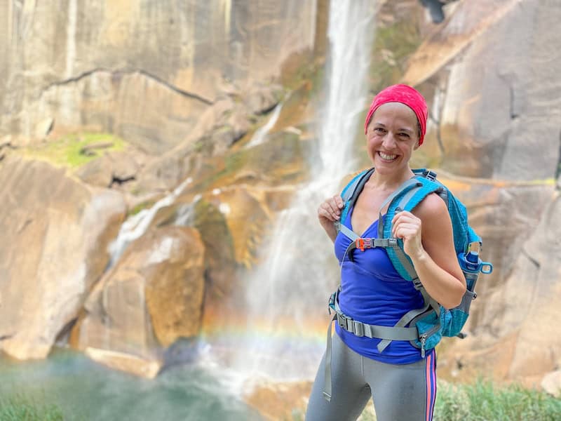 Posing in front of Vernal Falls along the Mist Trail in Yosemite National Park