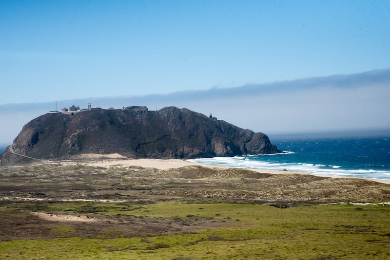 Admiring Point Sur State Historic Park while driving Big Sur along Highway 1 in California
