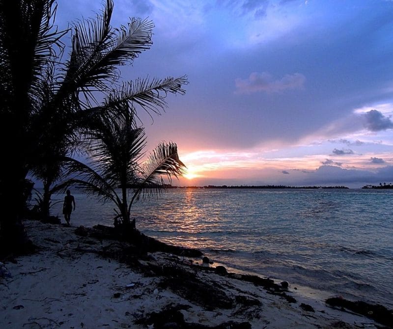 Enjoying sunset in the San Blas Islands on a solo female travel Caribbean vacation