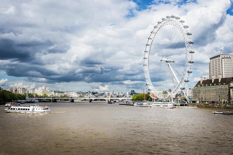 Visiting the London Eye beside the River Thames is one of the most fun things to do in London alone