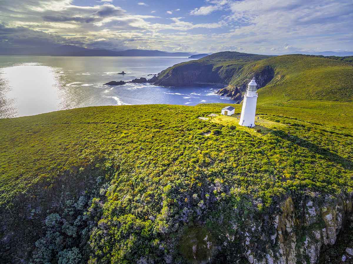Aerial view of Bruny Island Lighthouse at sunset. Tasmania, Australia.