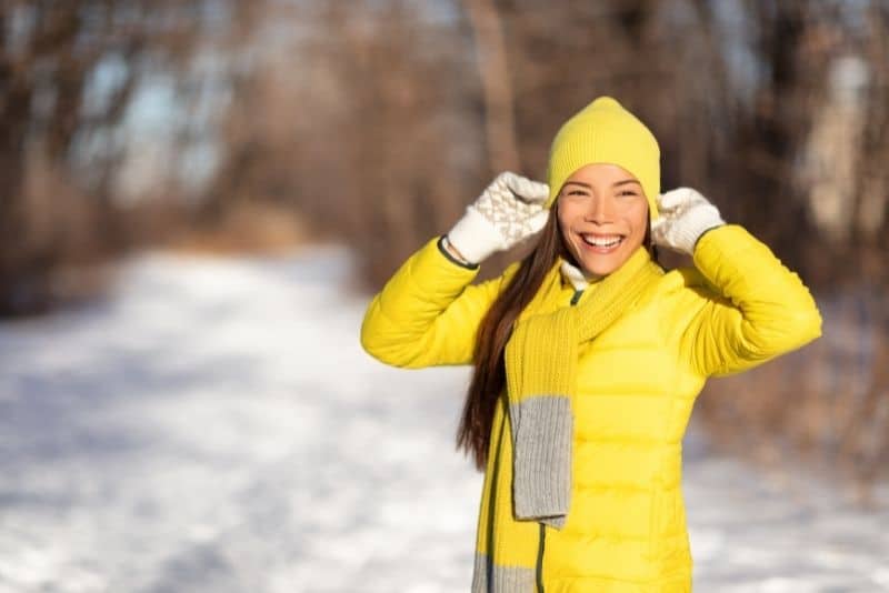 woman experimenting with bright colors for her NYC winter wardrobe