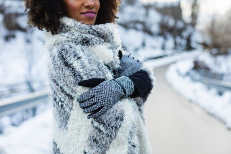 Smart gloves are a great pick for what to wear in NYC in winter