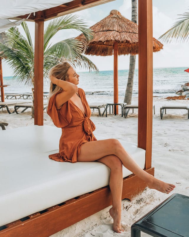 woman on a Cancun beach traveling solo in Mexico