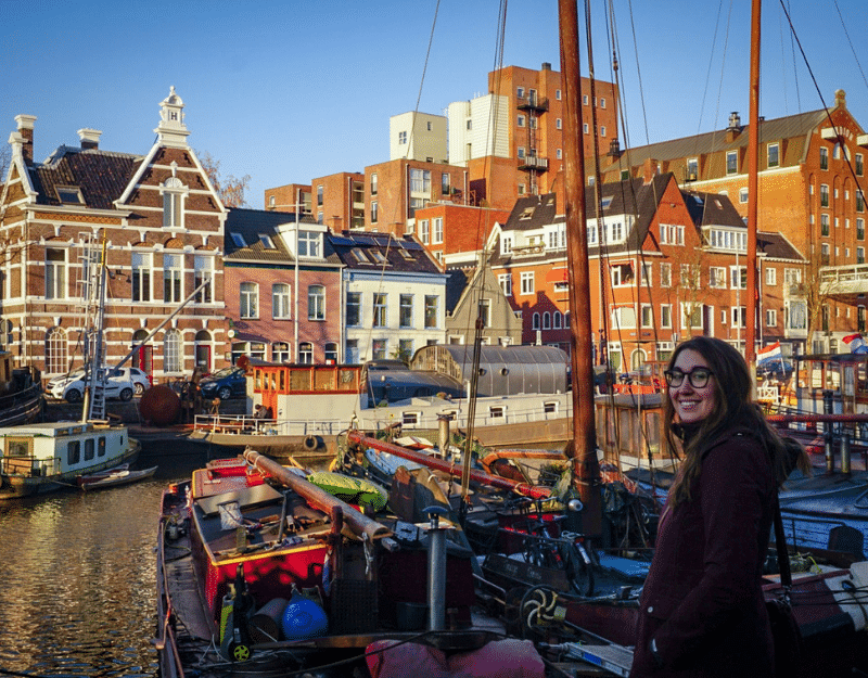 Woman moving to Amsterdam, one of the best digital nomad cities 