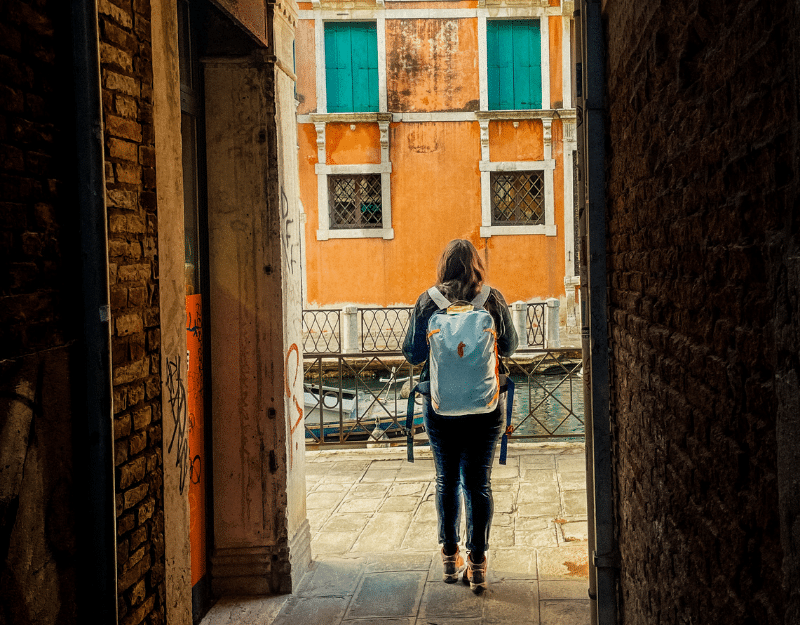 woman exploring Venice after a day working as a digital nomad
