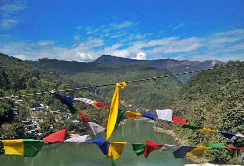 Seeing prayer flags in Northeast India during a solo trip to Asia