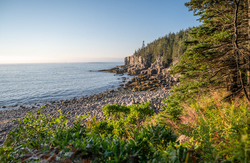 view of Monument Cove along Ocean Path at sunrise