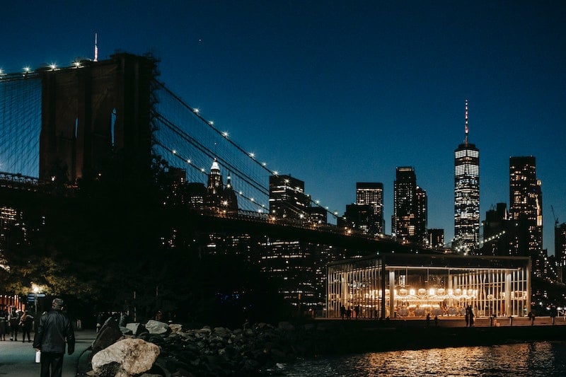 walking the Brooklyn Bridge in NYC after midnight