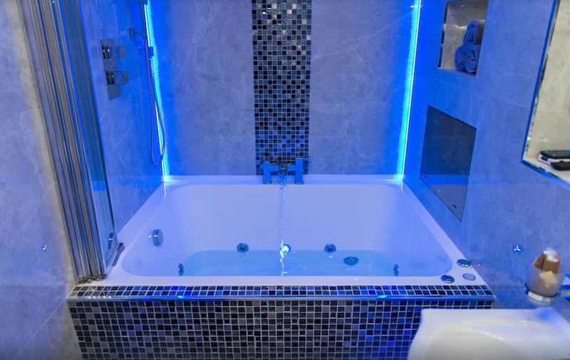 private hot tub in-room at the Aphrodite Suites Grand Spa Suite Jacuzzi Apartment