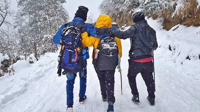 3 people hiking in winter in the Catskills of New York