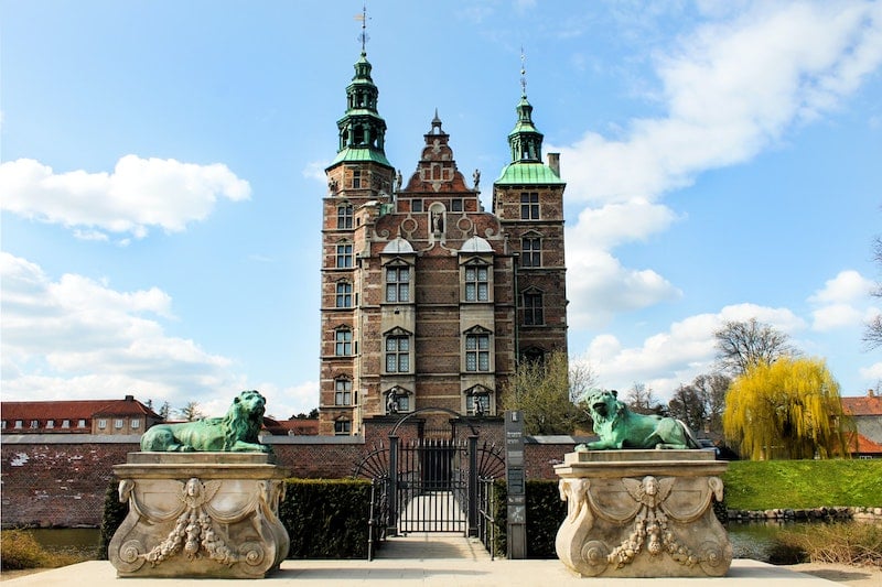woman viewing Rosenborg Castle during Copenhagen solo travel