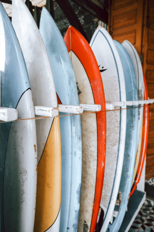 colorful surf boards lined up in a row