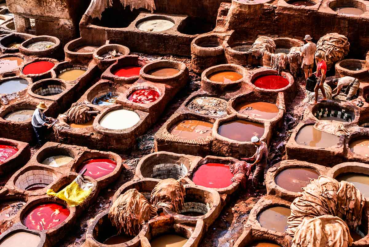 visiting the colorful leather tanneries of Fez during solo female travel in Morocco