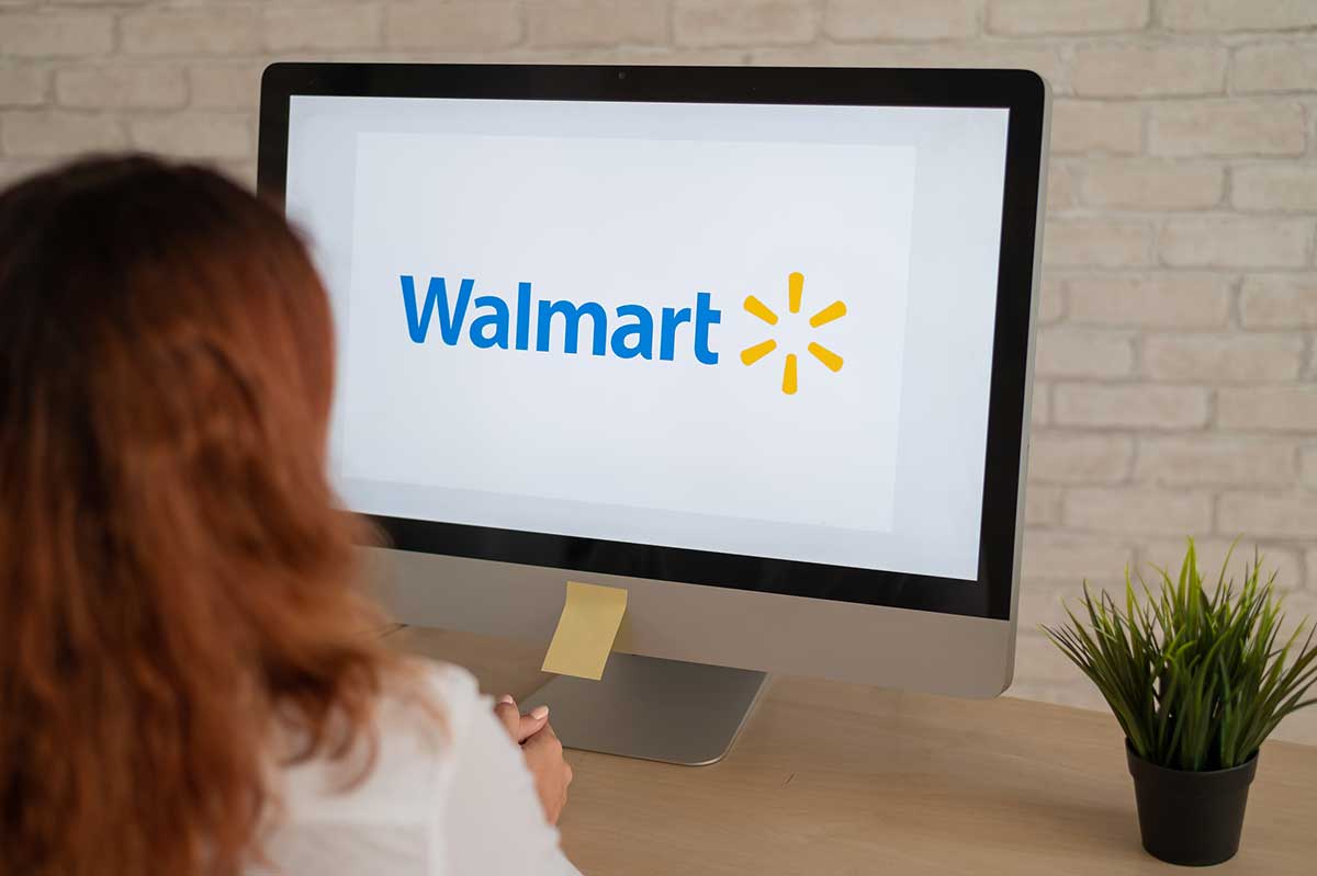 person shopping on the Walmart website for delivery to New York City