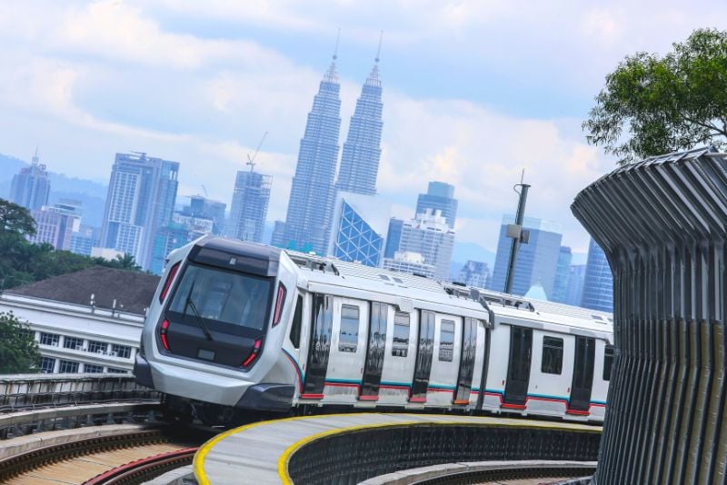 Malaysia MRT train with the Petronas Towers in the background