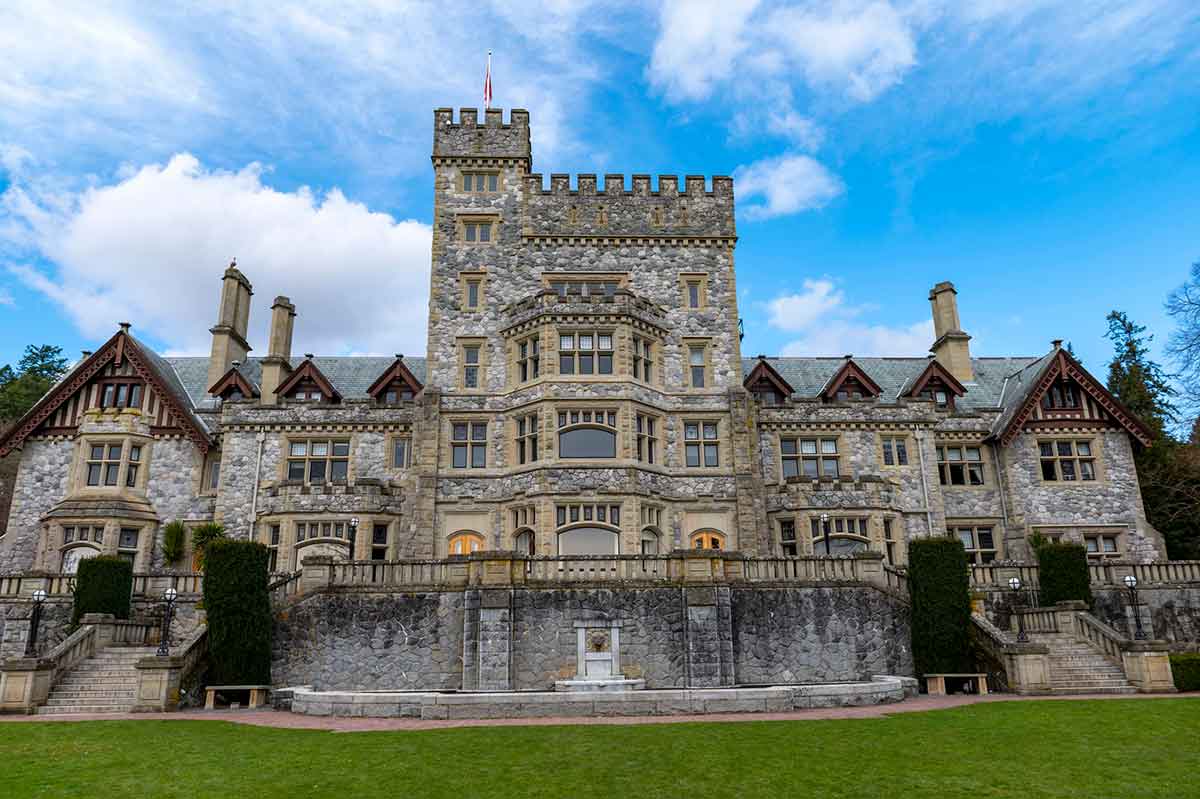 View of Hatley Castle against blue sky, located in Vancouver Island, British Columbia, Canada.