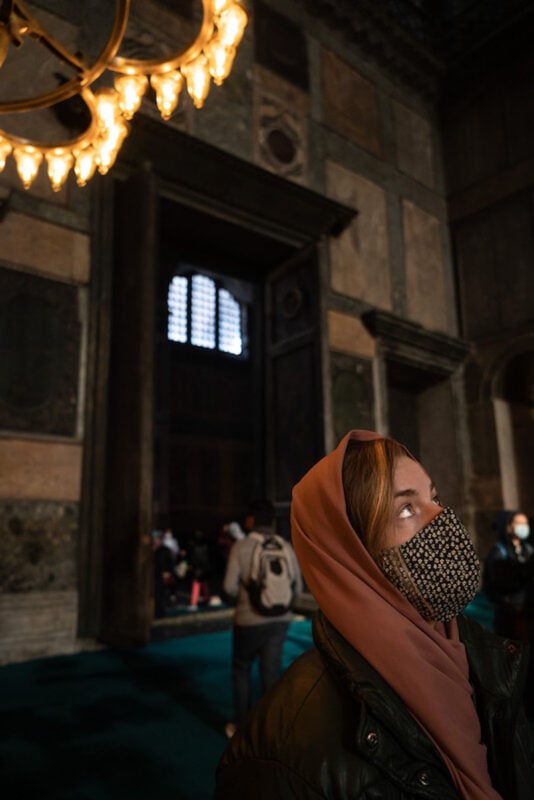solo traveler in Istanbul covering her hair in the Hagia Sophia