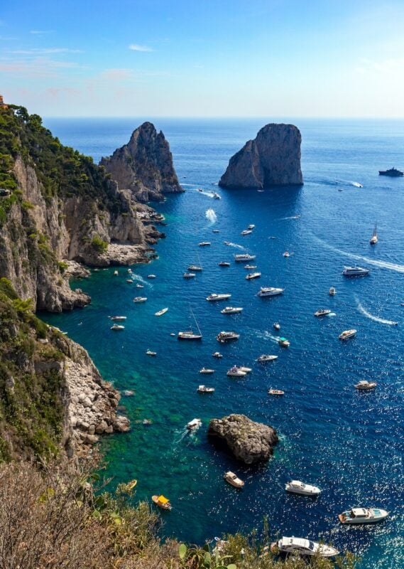 cove with boats along the island of Capri near Rome, Italy