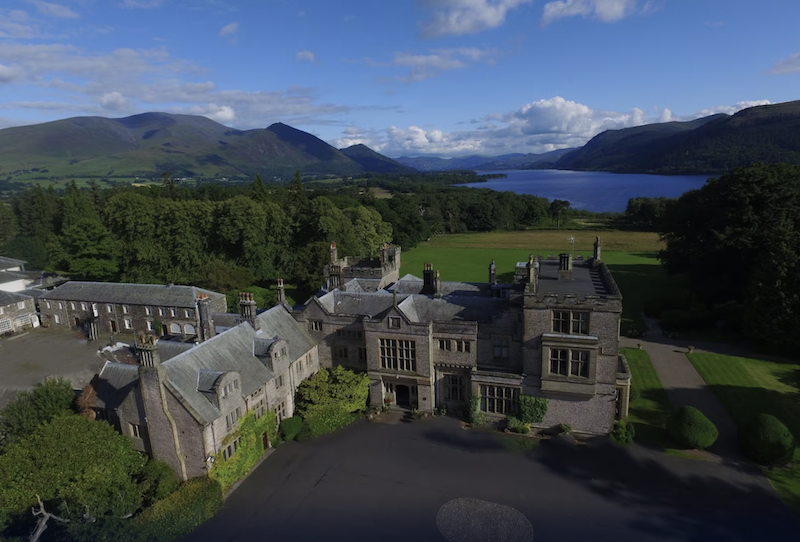 ariel view of the Armathwaite Hall Hotel with blue lake in the background