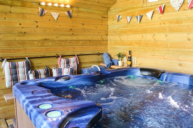 lodge with a hot tub in the Cotswolds at Painswick Hill House