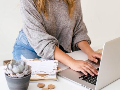 woman on her laptop working on growing her traffic