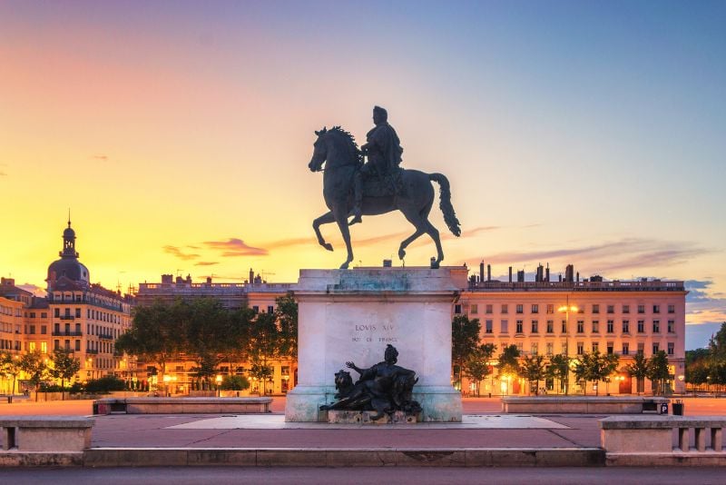 Lyon's famous Louis XIV statue at sunset