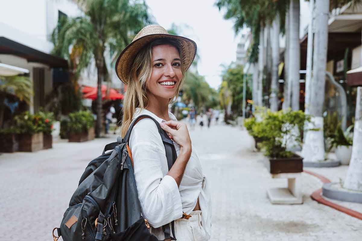Portrait of young latin woman tourist in Tulum, Mexico.