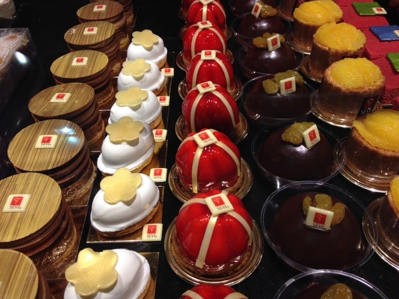 French pastries in one of the luxury shops of the Halles Paul Bocuse