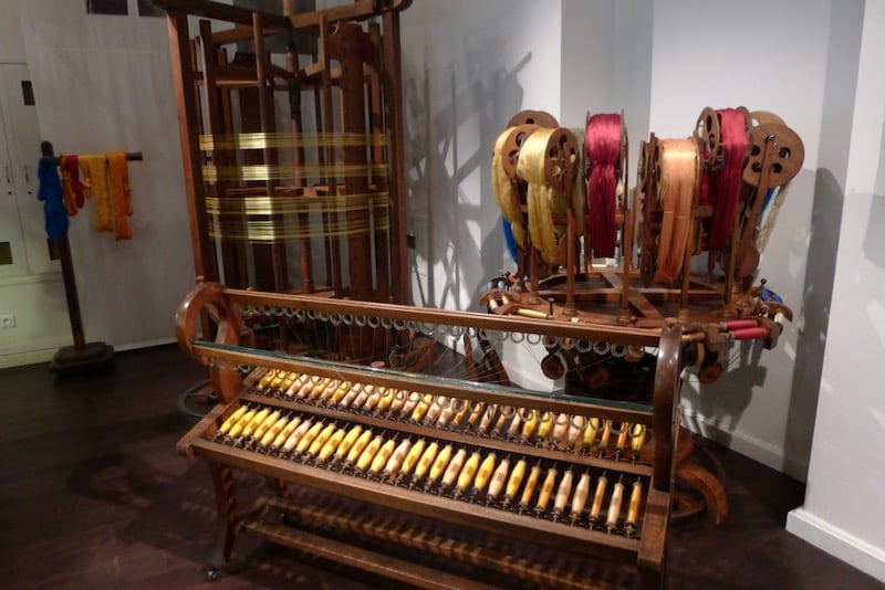 Silk weaving equipment in the Maison des Canuts, the silk museum in Lyon, France