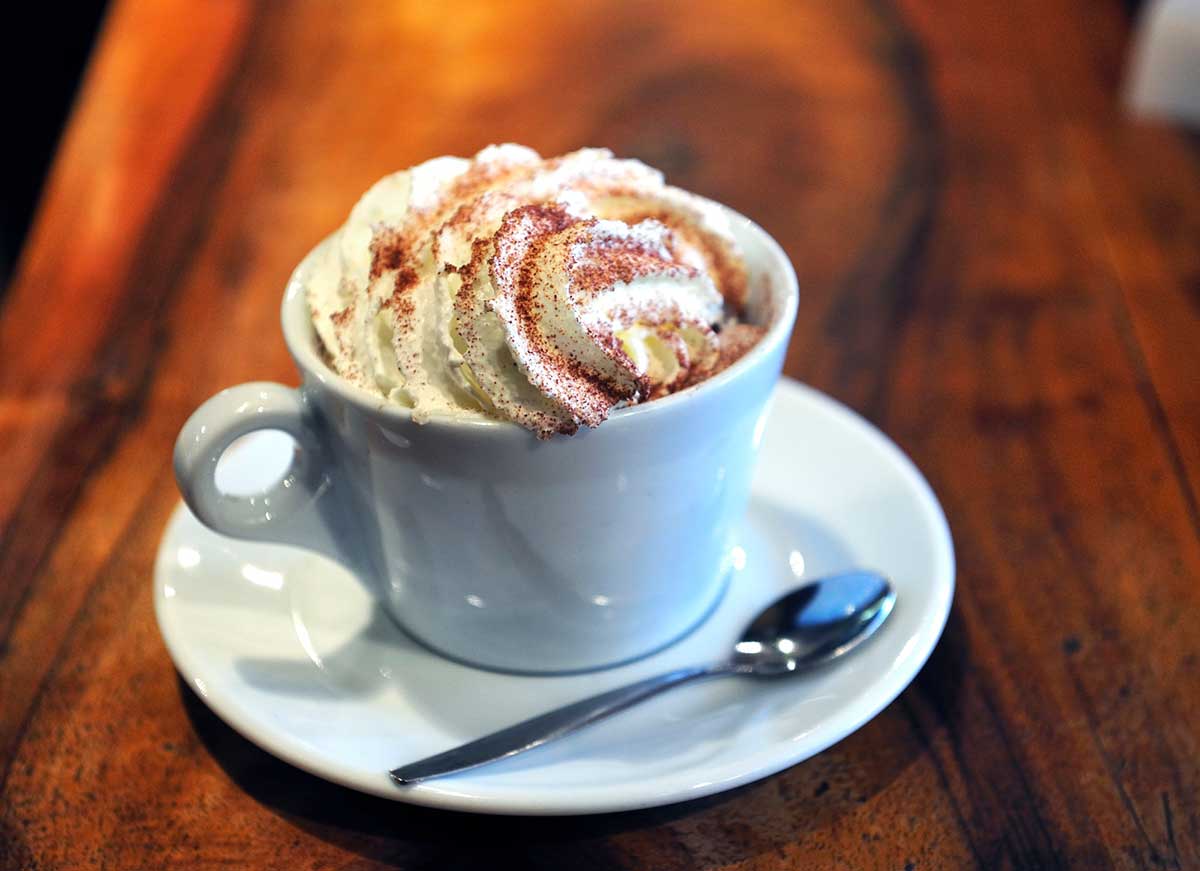 A close up photo of a cup of Viennese coffee.