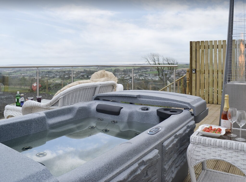 rooftop hot tub with countryside view near Glasgow