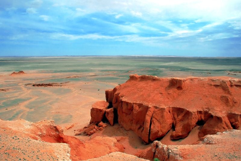 bright red Bayanzag Flaming Cliffs tourist attraction in Mongolia