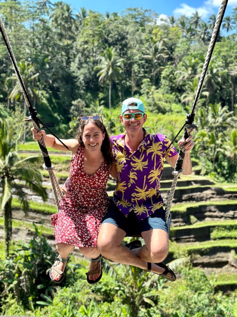 couple on the Bali swing over the rice terraces