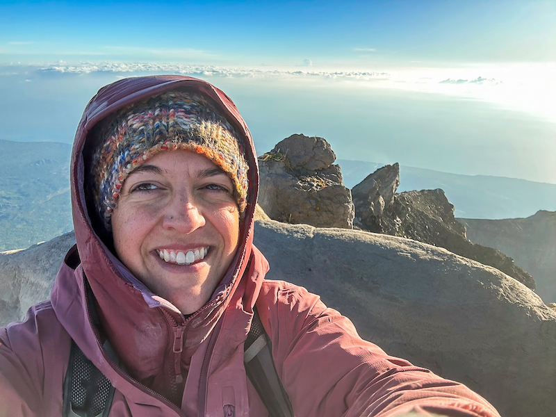 woman taking a selfie at the Mt Agung summit