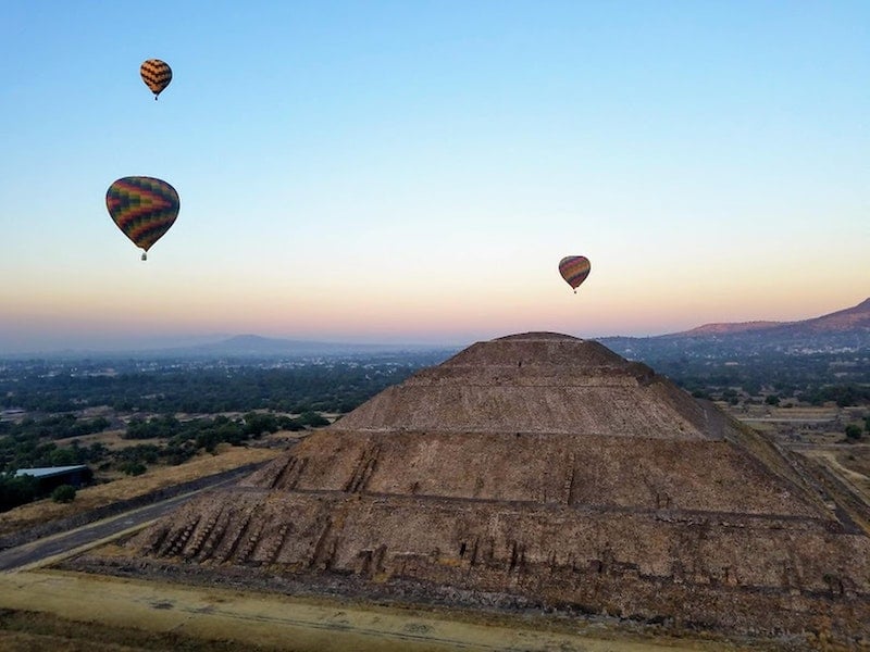 hot air balloons over Teotihuacan