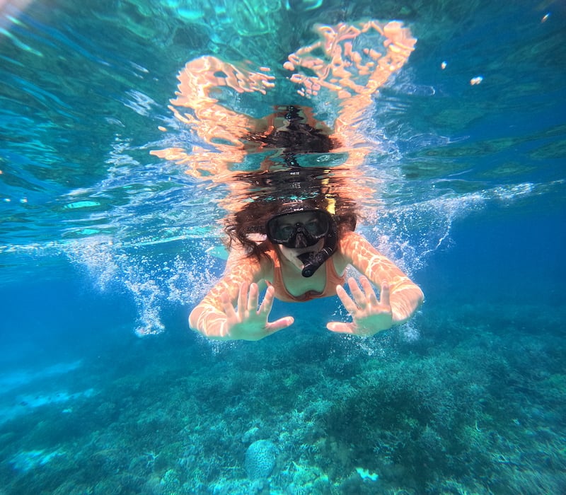 woman snorkeling in the Komodo Islands