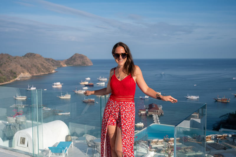 female traveler enjoying Labuan Bajo harbor views from the Loccal Collection Hotel during a 2 week trip to Bali